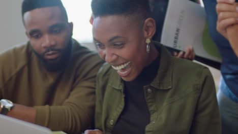 happy business people celebrating corporate success black colleagues enjoying successful victory clapping watching laptop in cheerful office workplace close up
