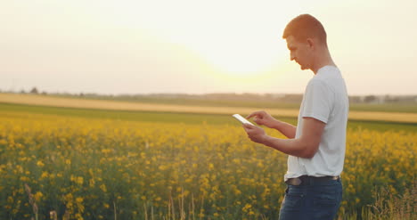 agriculture technology young farmer using digital tablet