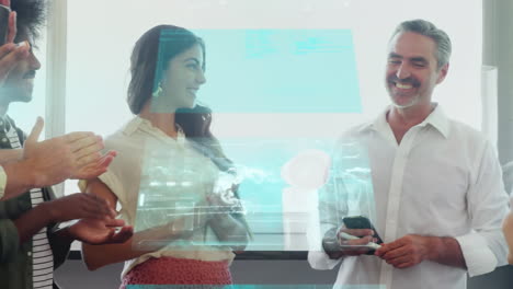 animation of data moving over happy diverse male and female business colleagues in office