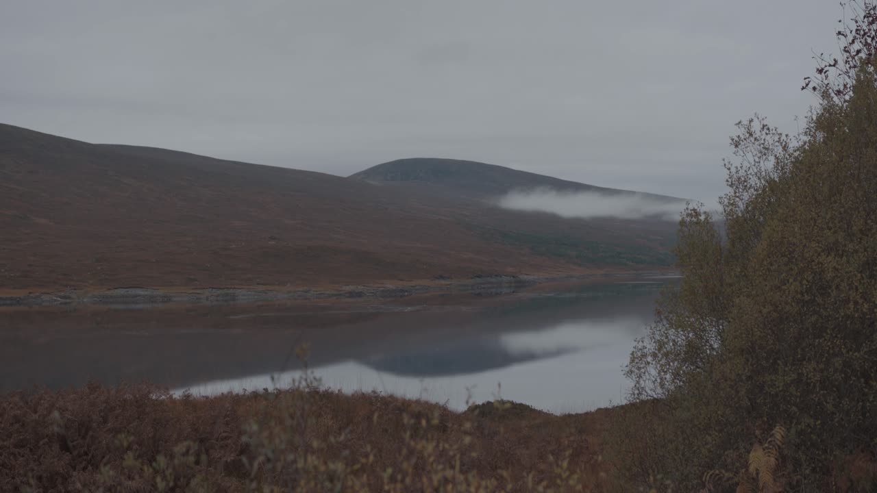 Scenic Autumn Landscape with Lake and Mountains