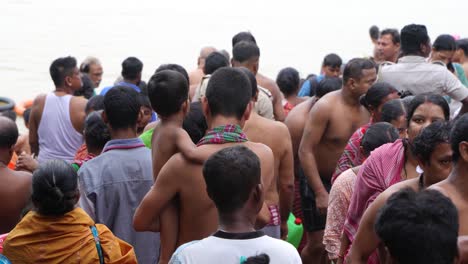 on the eve of durga puja, hindus gather at ganges for bathing and tarpan on mahalaya day.