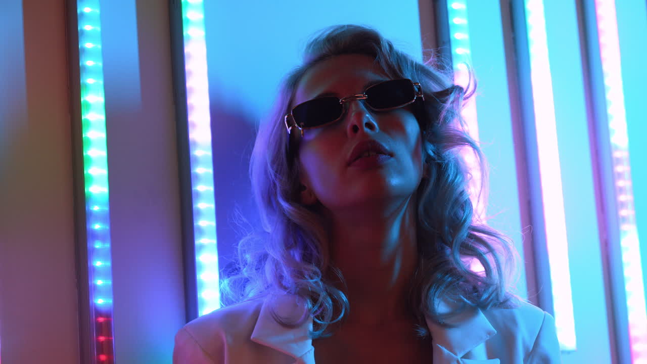 Fashion model wearing white suit