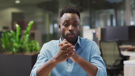 video of focused african american businessman having video call