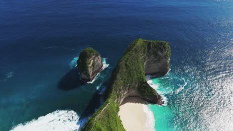 aerial view of the famous kelingking beach or t-rex bay in nusa penida, bali, indonesia.