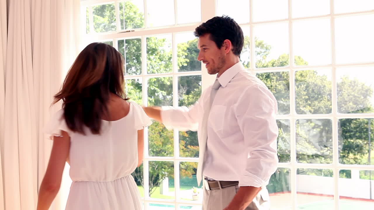 Happy couple dancing together 