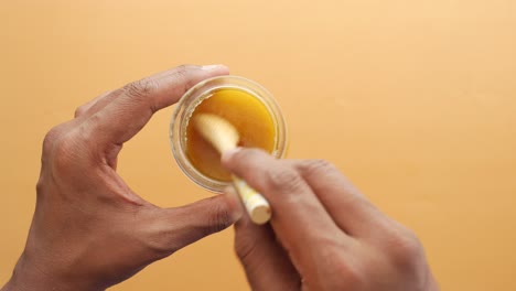 Homemade-ghee-in-container-on-a-table