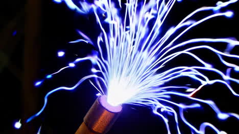 close-up of fiber optic light emission in the dark