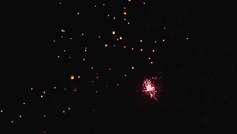 Sky Lanterns and Fireworks at Night