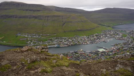 panning shot from viewpoint on klakkur mountain showing klaksvik city