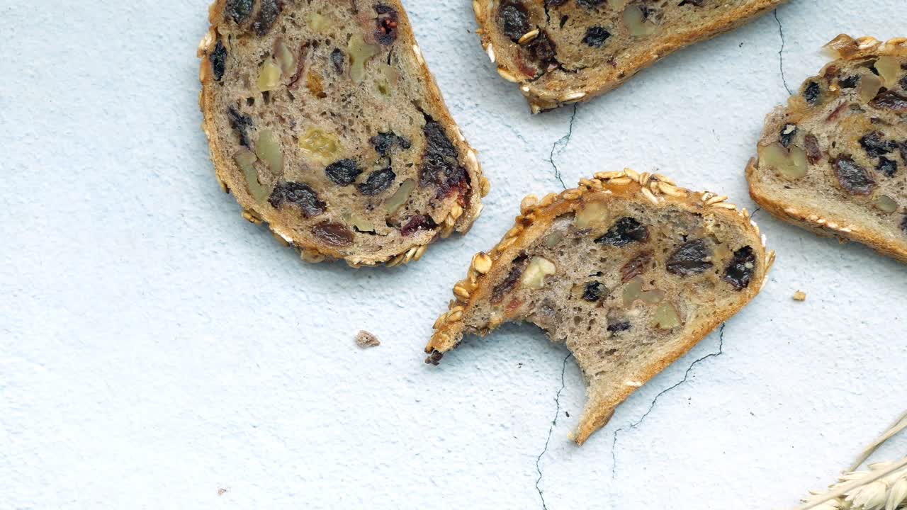 Brow bread with raisins on table ,