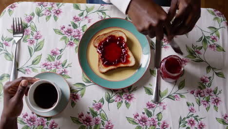 breakfast with toast, jam, and coffee