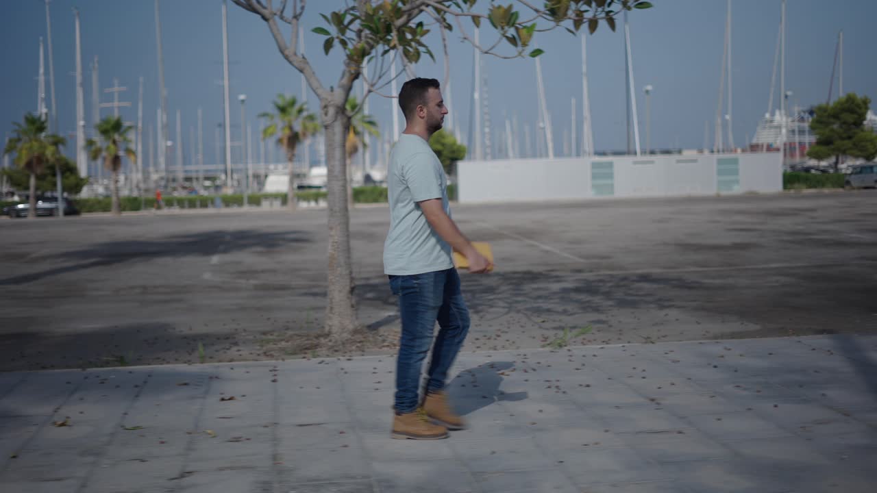 Man Walking in Harbor City