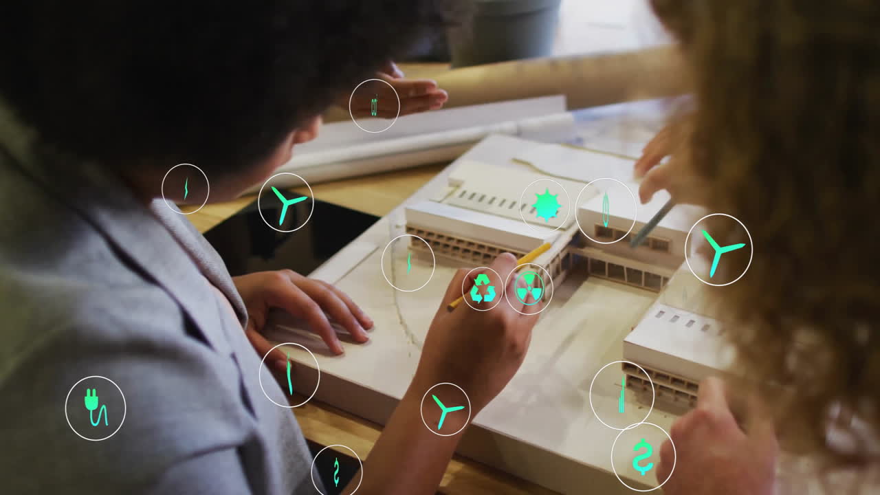 다양한 팀과 협력하여 지속 가능성 아이콘 애니메이션으로 건축 모델을 계획합니다.