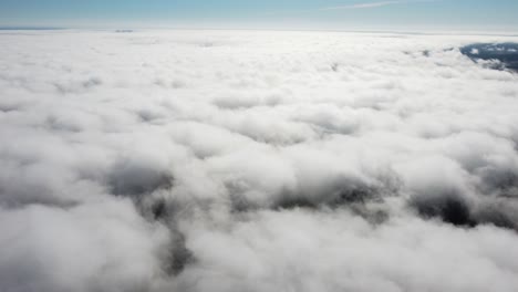 Mist-fog-clouds-from-above-aerial-view-over