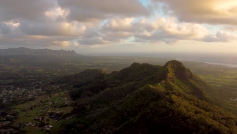 "sleeping giant" hill in kauai, hawaii, cinematic aerial view over beautiful mountains in hawaii, showing the stunning green nature