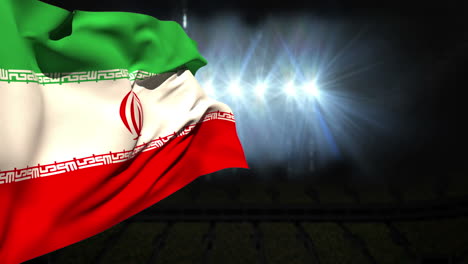 una gran bandera nacional iraní ondeando