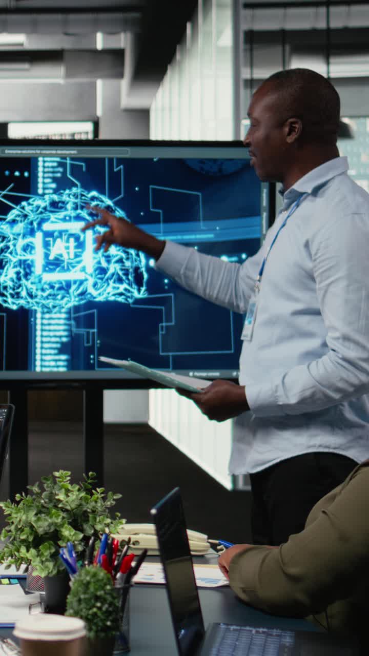 Vertical video Programmer gives presentation to executives, implementing AI chatbot