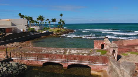 Droning-towards-the-Atlanta-Ocean-in-San-Juan-Puerto-Rico-near-Fuerte-San-Geronimo