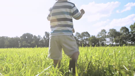 Mother-and-son-playing-football