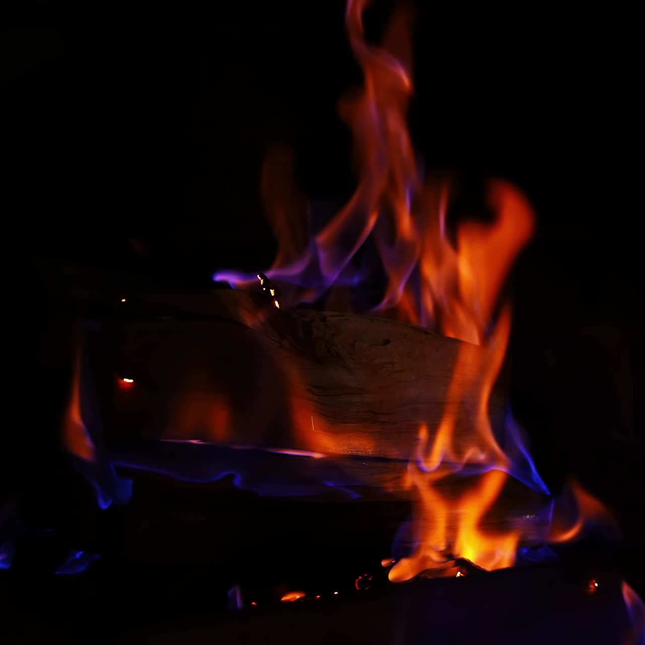 Roaring flames in modern fireplace