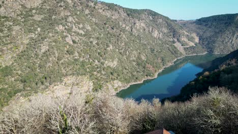 Monastery-santa-cristina-of-ribas-by-sil-river-canyon,-ourense,-spain,-aerial-dolly