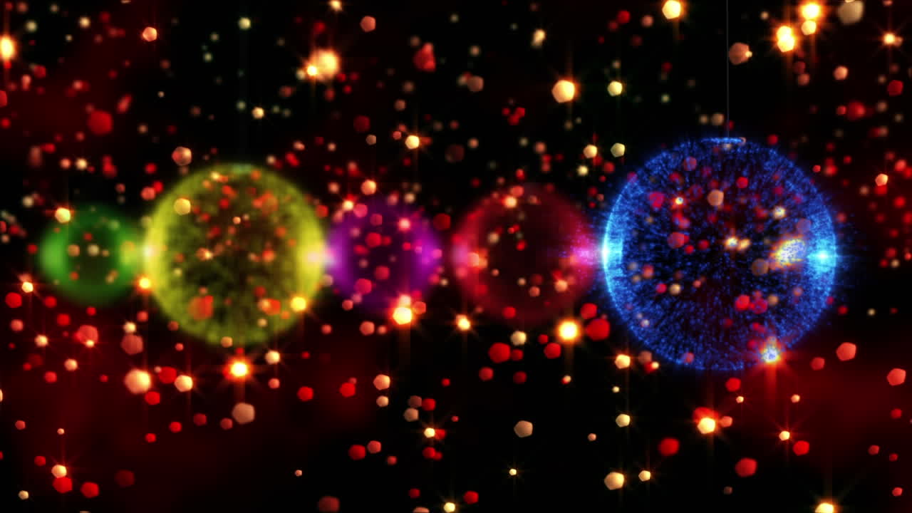 검은색 배경의 밝은 반점 위에 크리스마스 트리 장식의 애니메이션