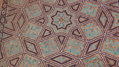 intriscate star tiled designs on islamic architecture in samarkand, uzbekistan along the historic silk road