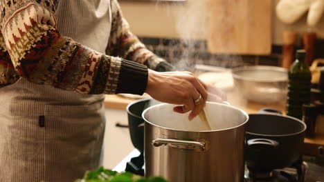 a man cooking in the kitchen