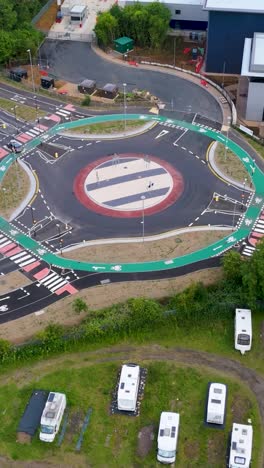 vertical slow drone orbit over dutch roundabout in hemel hempstead, hertfordshire, uk