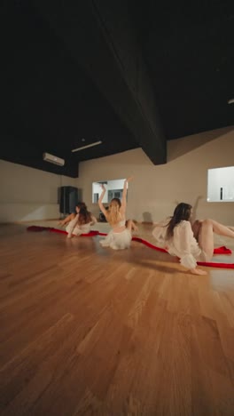 contemporary dance performance with red ribbons