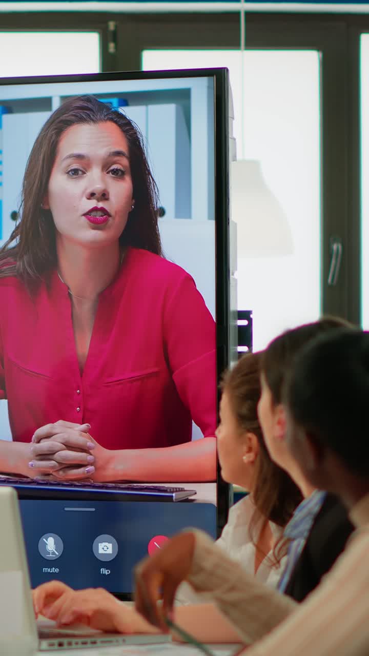 Vertical video Multietchincal team listening confident businesswoman webinar speaker coach