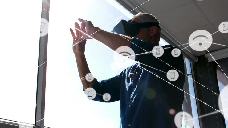 Animation of networks of connections and businessman wearing phone vr headset
