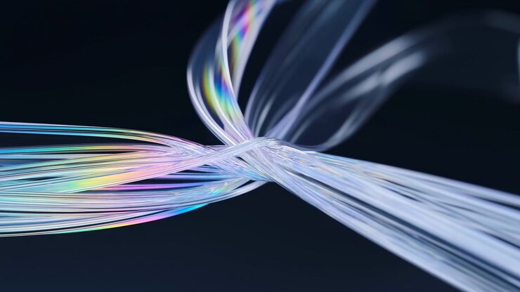 Filamenti traslucidi si curvano e scorrono attorno a un centro annodato, con riflessi lucidi color arcobaleno e uno sfondo blu notte che creano un movimento astratto ed elegante.