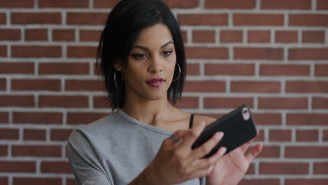 portrait attractive young hispanic woman taking selfie photo using smartphone mobile camera smiling enjoying connection slow motion