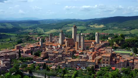 orbiting aerial view of an entire san gimignano historic town in