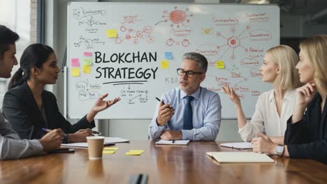 a strategic discussion on blockchain implementation: professionals collaborating in a modern conference room to shape innovative ideas and solutions