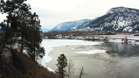 Aerial-Pan-Shot-of-the-Thompson-River-close-to-Chase-in-British-Columbia-,-stunning-winter-scene