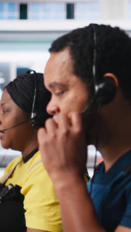 vertical video engineer provides technical support via headset in solar panel factory