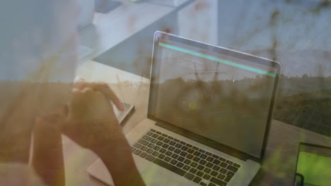 woman coding on laptop at desk with phone, displaying floating code snippets and data icons