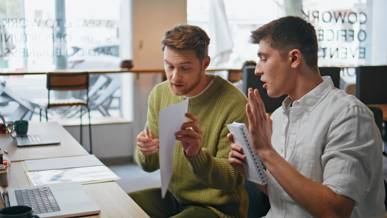 Startup team videocalling computer online in office closeup. Colleagues talking