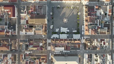 Topdown-view-Along-Urban-grid-with-rooftops-towards-Recreational-harbor,-Vila-Real-de-Santo-Antonio