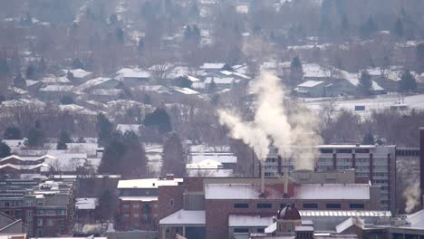 aerial view of smoke arising from industrial facilities