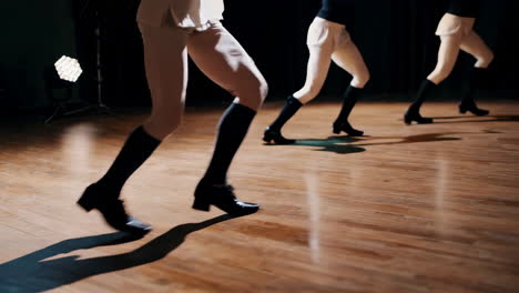 Dancers' Legs and Feet on a Stage During a Performance