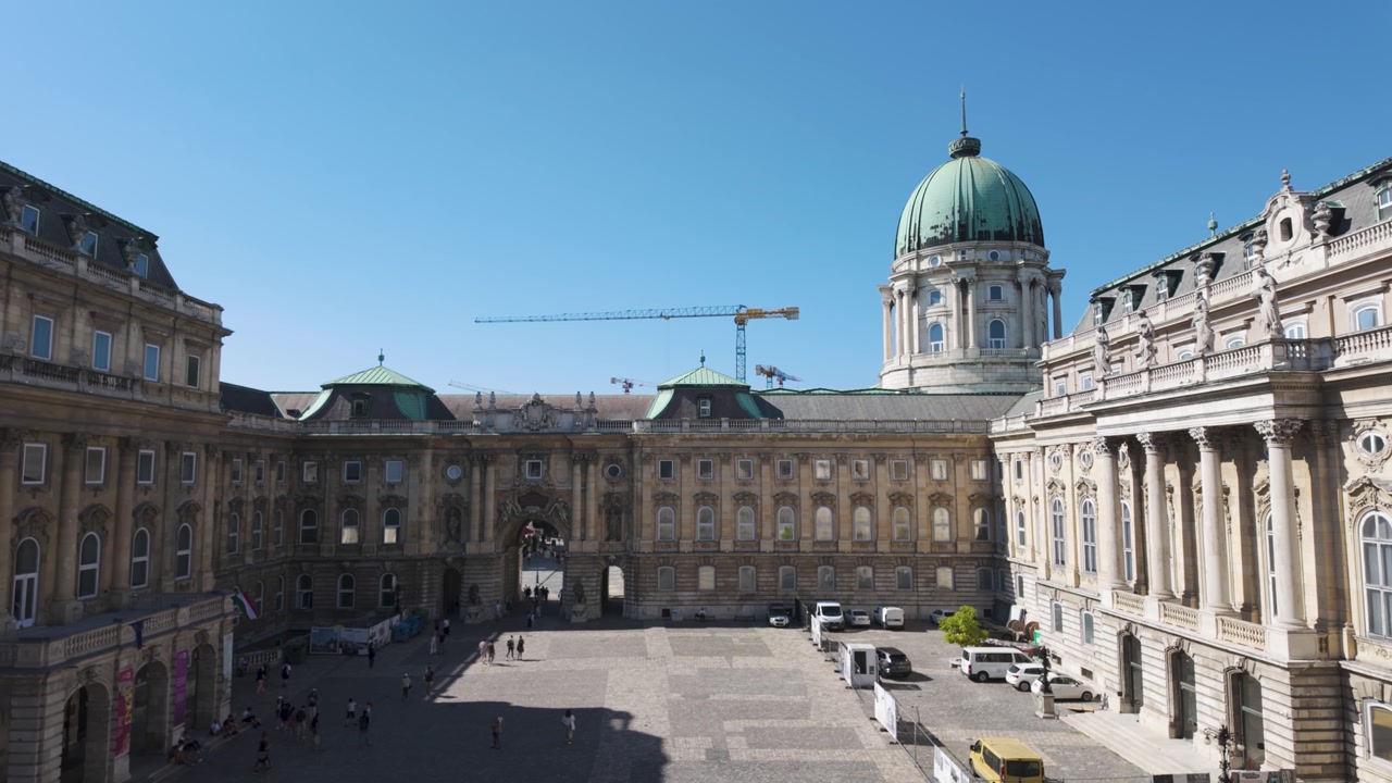 View of the historic inner courtyard of Buda Castle, highlighting its ornate architecture and medieval charm