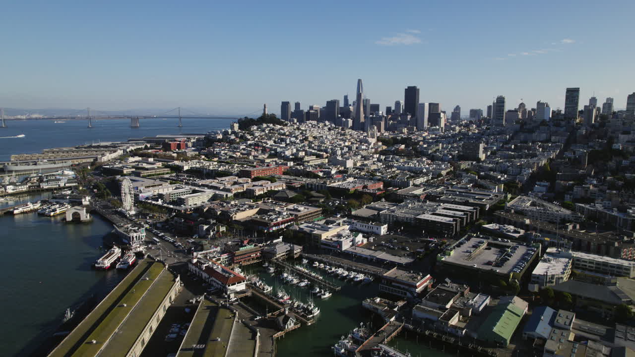 Aerial tracking shot overlooking the Fisherman&rsquo;s Wharf, in sunny San Francisco