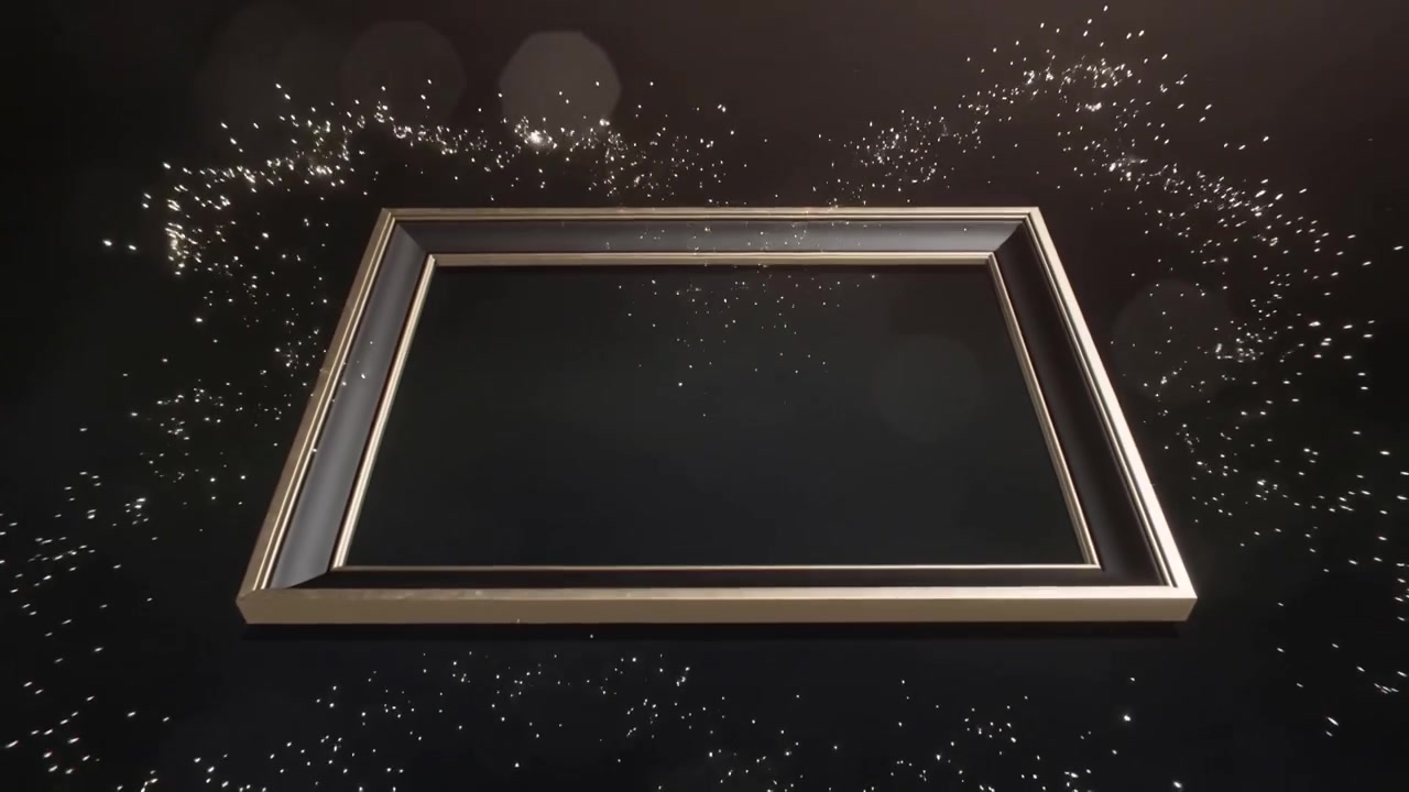 Sweeping black silk cloth sending golden particles outlining gold metal frame on dark stage