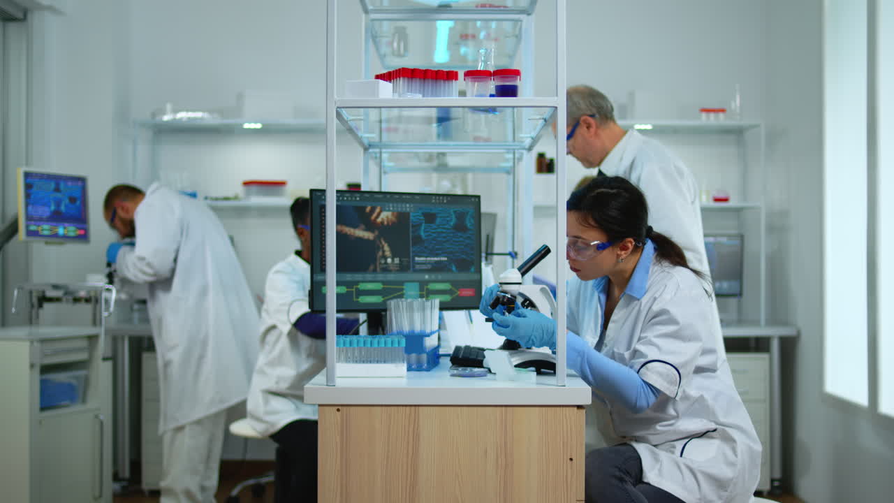 Professional team of scientists preparing vaccine against new virus