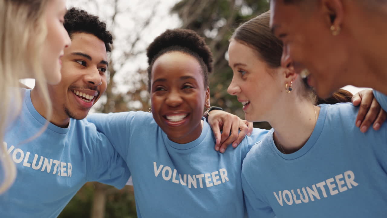 Group of Volunteers Smiling and Talking Together