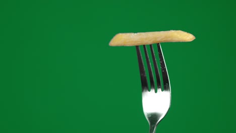 the fries on the fork slowly rotates.