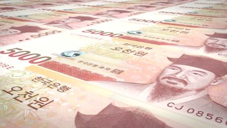 billetes de cinco mil won de corea del sur rodando, dinero en efectivo, bucle